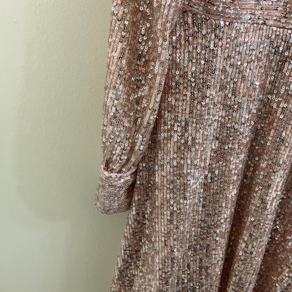 A short pink /silver glitter dress